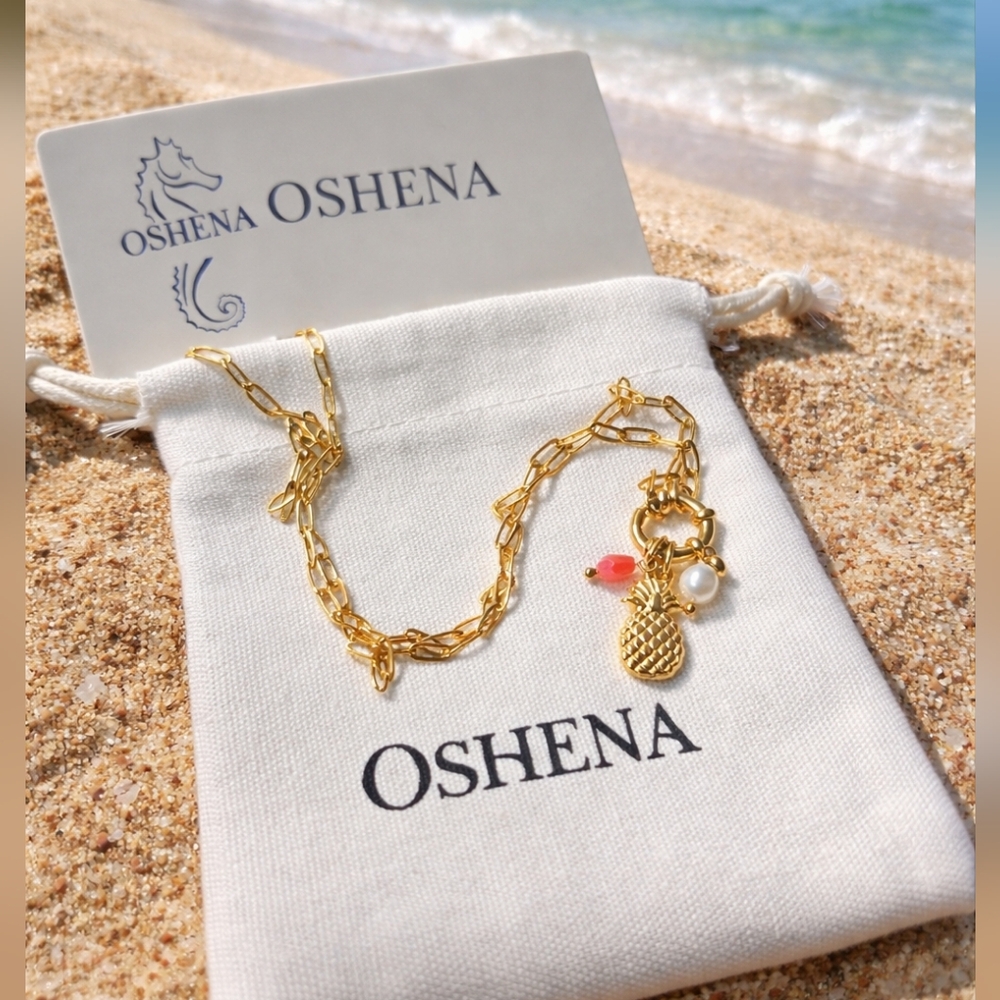 OSHENA CHARM NECKLACE